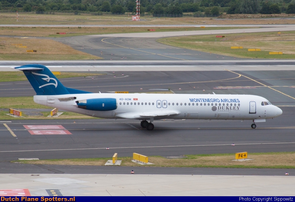 4O-AOM Fokker 100 Montenegro Airlines by Sippowitz